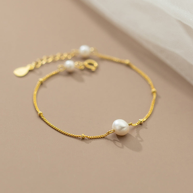 Bracelet à breloques en perles baroques