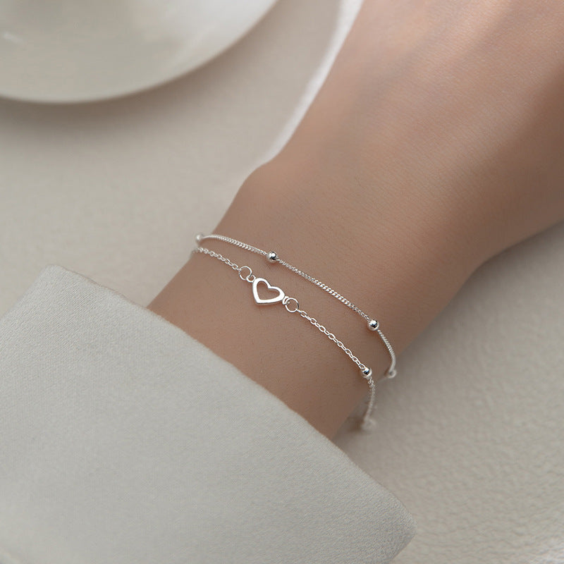 Bracelet de chaînes d'amour perlées