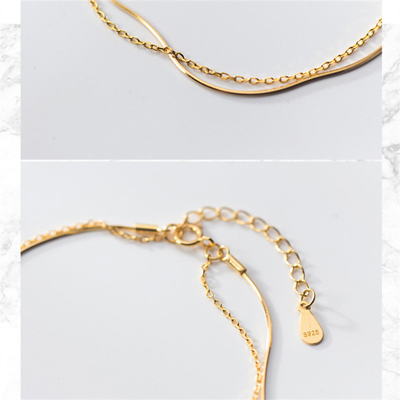 Double Gold Snake Bone & Chain Bracelet