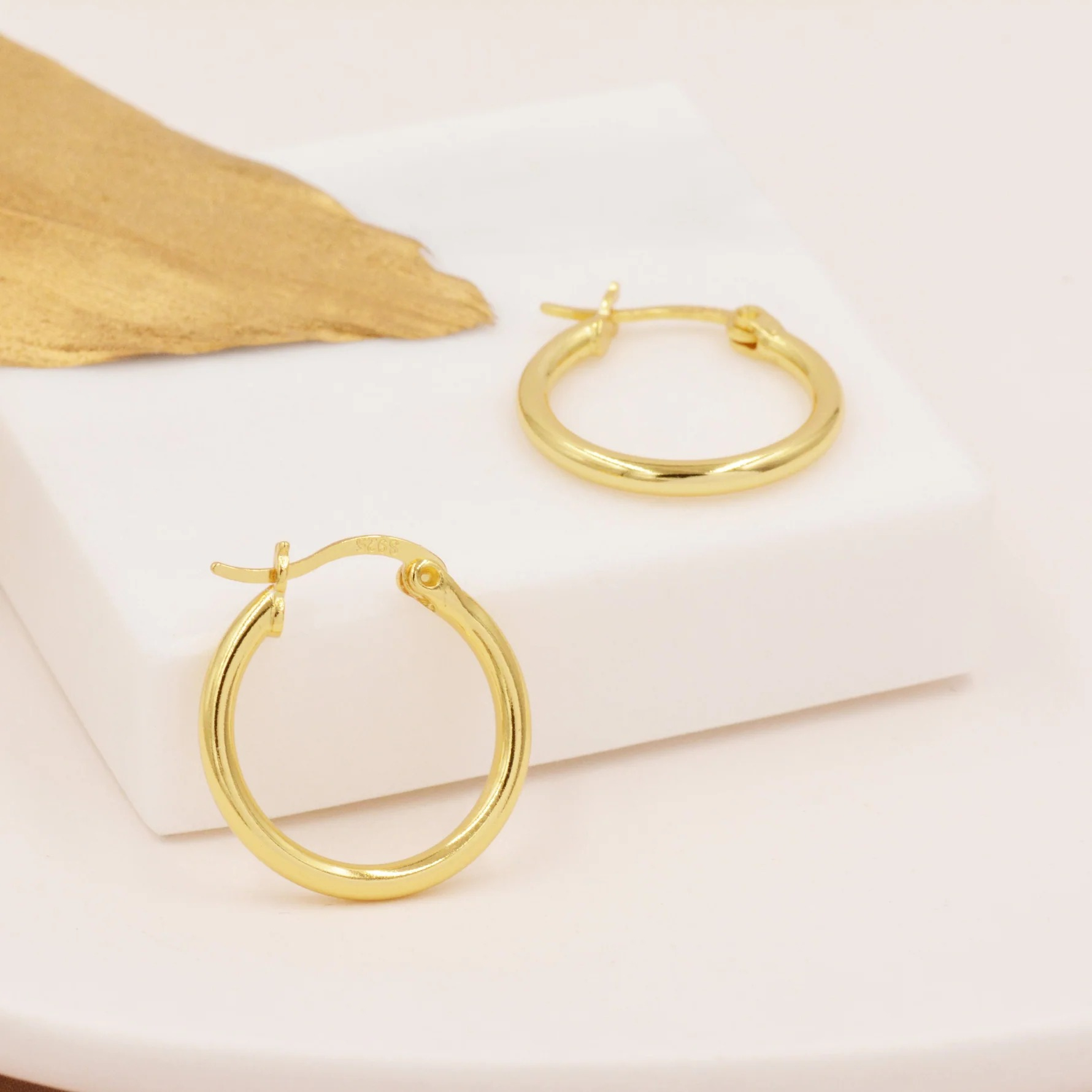 Pair of Minimalist Huggie Hoop Earrings - Image 8