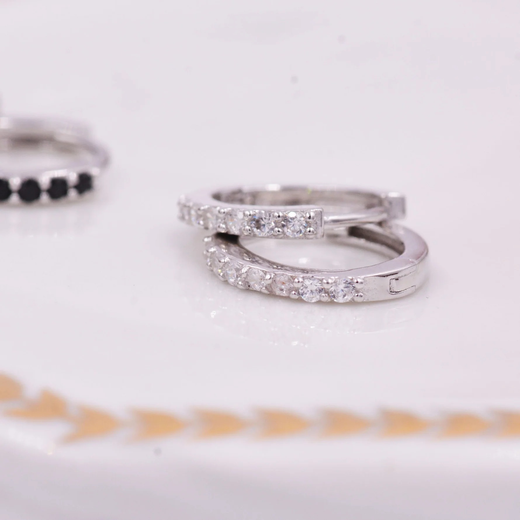 Pair of Minimalist Huggie Hoop Earrings - Image 4