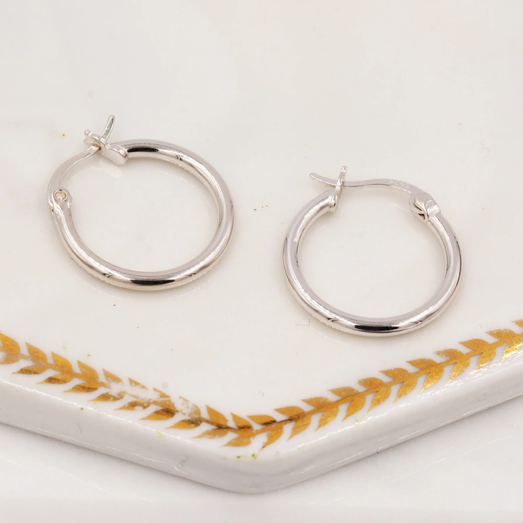 Pair of Minimalist Huggie Hoop Earrings - Image 3