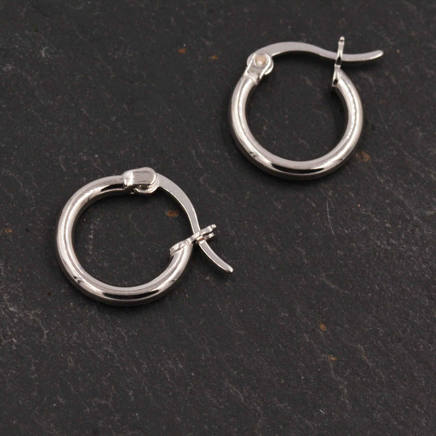 Pair of Minimalist Huggie Hoop Earrings - Image 4