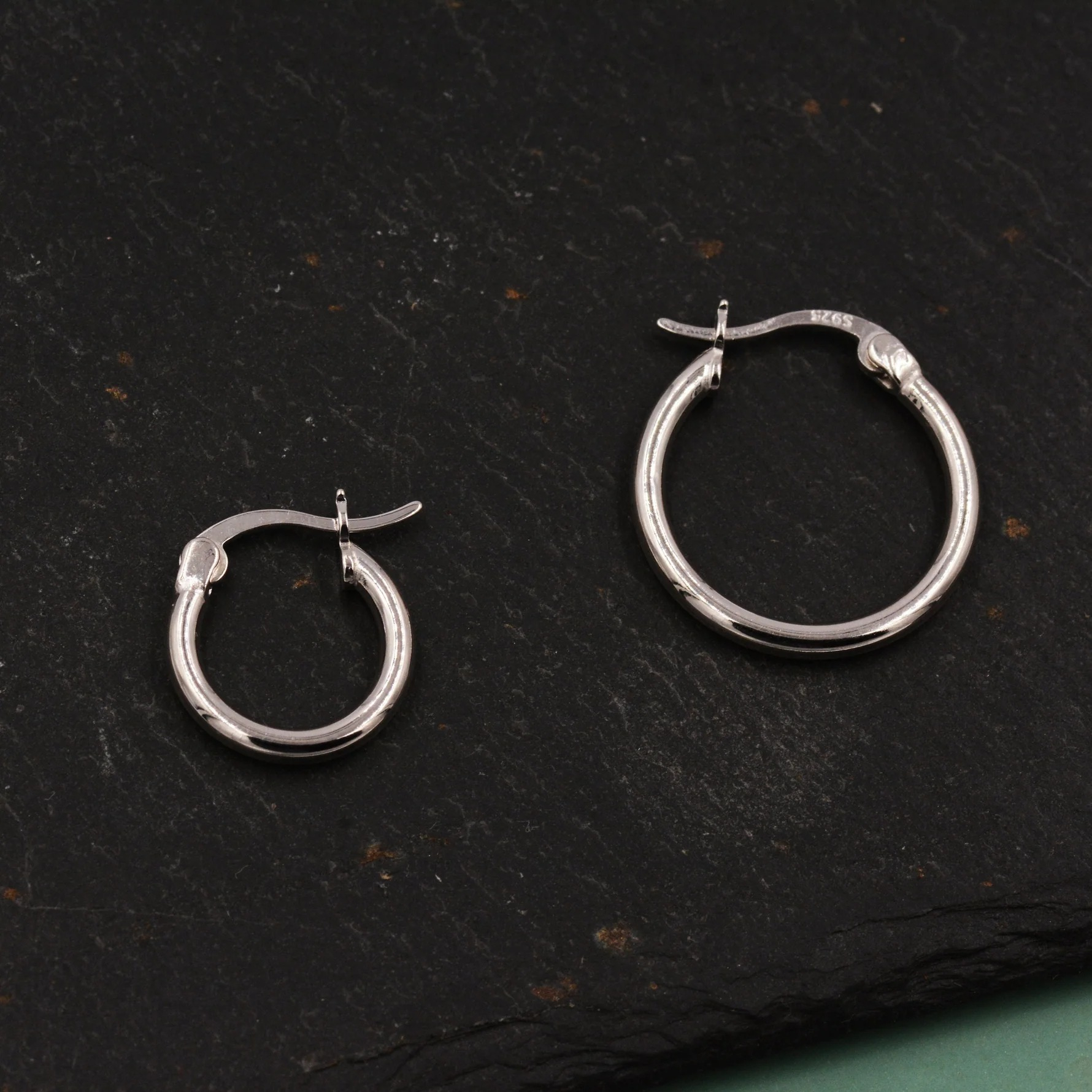 Pair of Minimalist Huggie Hoop Earrings - Image 5