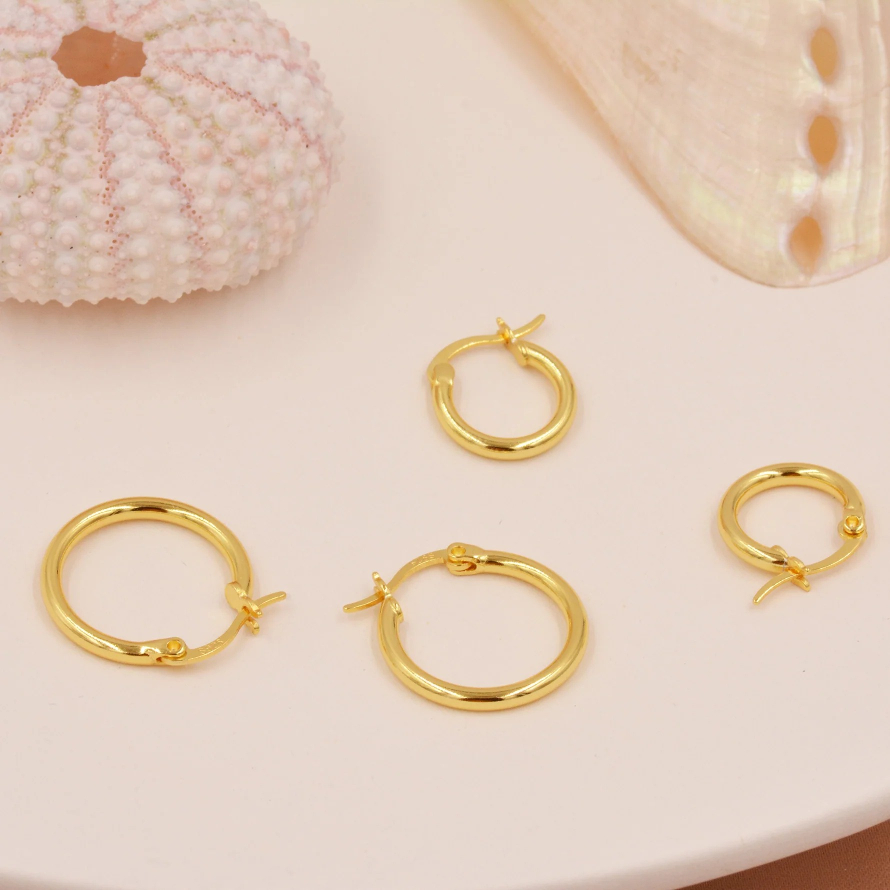 Pair of Minimalist Huggie Hoop Earrings - Image 6
